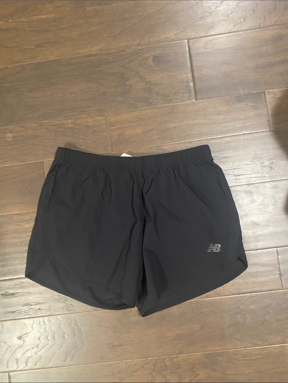 New Balance Black Athletic Shorts with reflective NB logo
